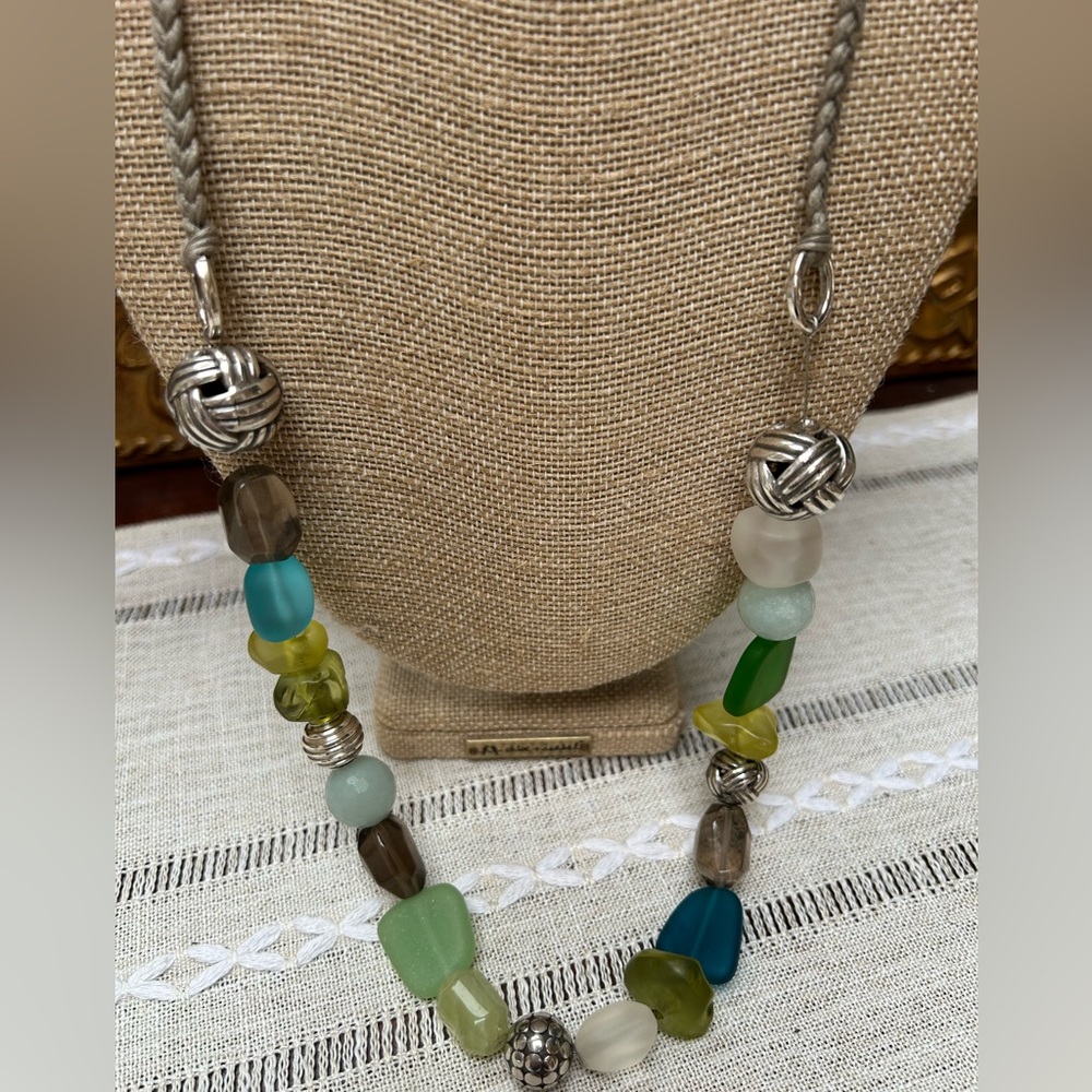Hand made with glass and silver beads, adjustable to 18”